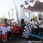 Bupati Purworejo Yuli Hastuti saat melepas langsung seluruh peserta jalan sehat Hari Koperasi.