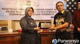 Penandatanganan naskah kesepakatan oleh Bupati Yuli Hastuti dan Kajari Widi Trismono pada Jumat (21/8/2026).